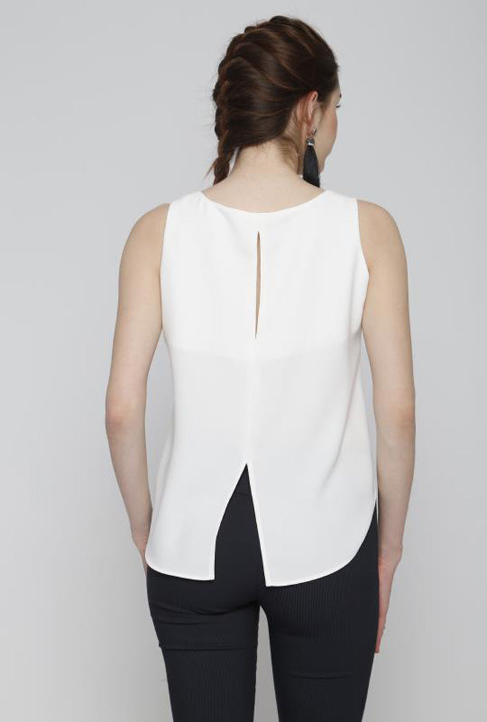 white blouse, hi low hemline, back slit