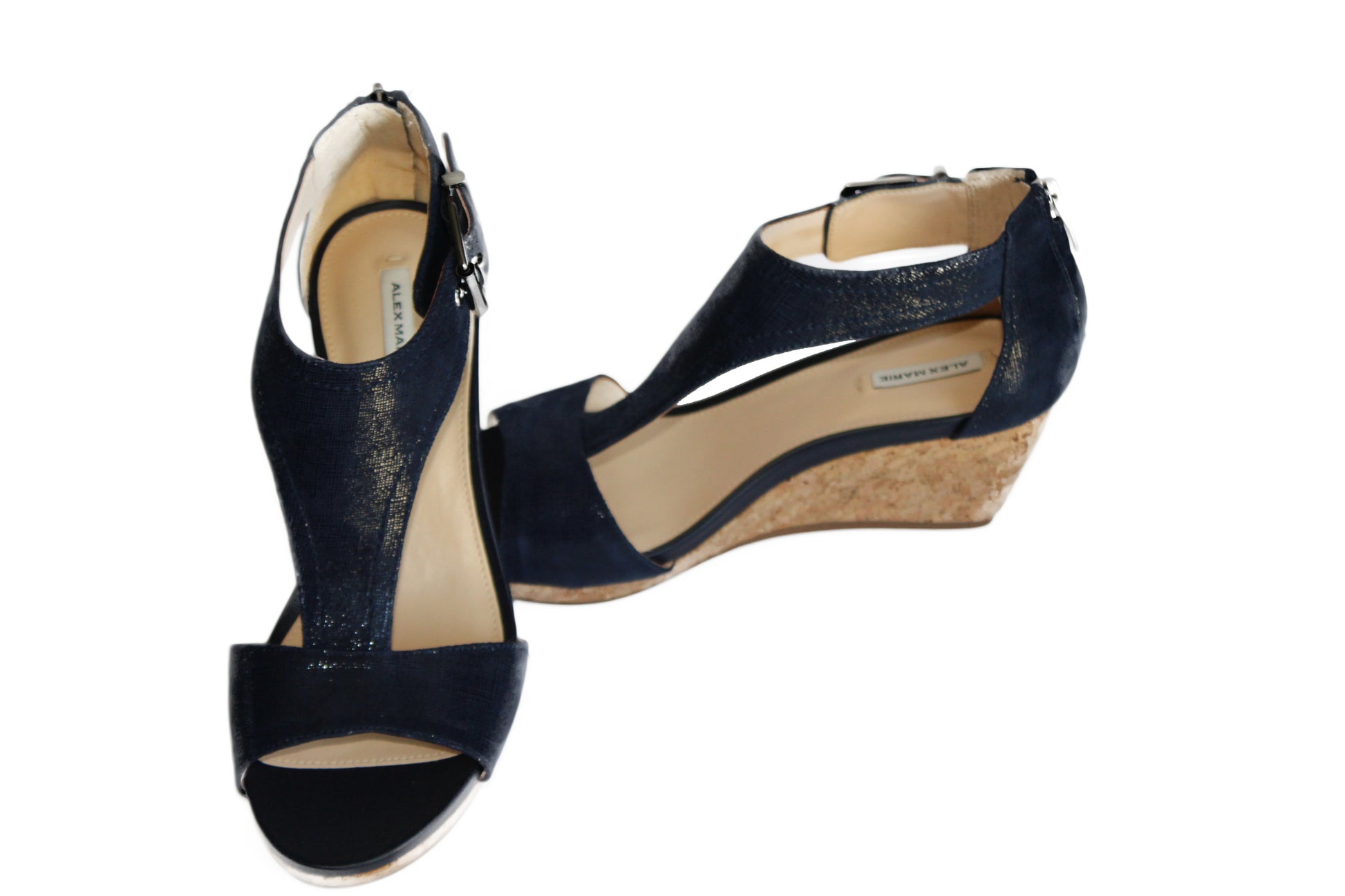 feature leather upper, adjustable buckled ankle strap closure, synthetic lining, cushioned footbed, cork platform wedge & rubber outsole. Approx. 2.56 wedge with a 0.39” platform
